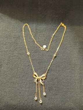 Gold Tone Bow with Dangle Accents Dainty Delicate Statement Pendant Necklace